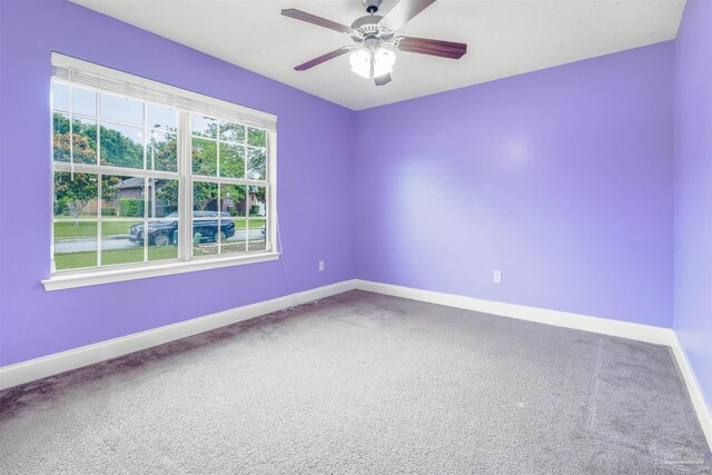 2546 Stormy Cir, Navarre, FL 32566 - carpeted empty room with baseboards and ceiling fan