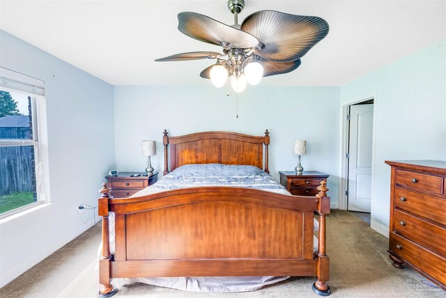 2546 Stormy Cir, Navarre, FL 32566 - bedroom with baseboards, carpet flooring, and a ceiling fan