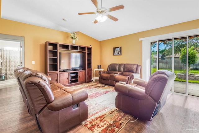 2546 Stormy Cir, Navarre, FL 32566 - living area with wood finished floors, a ceiling fan, and lofted ceiling