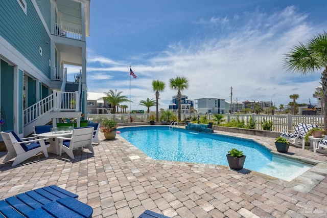 view of pool with a patio area