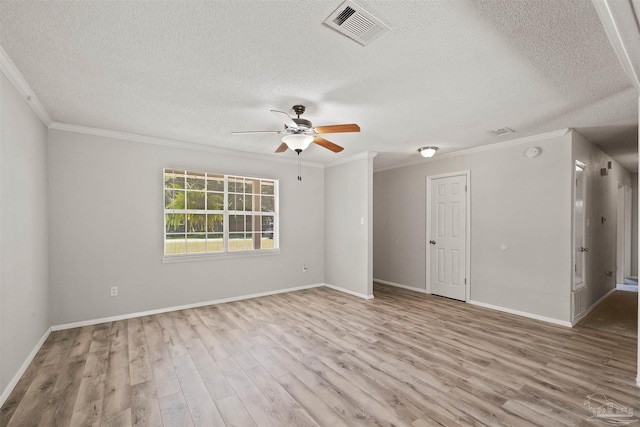 spare room featuring ceiling fan, a textured ceiling, light hardwood / wood-style flooring, and ornamental molding