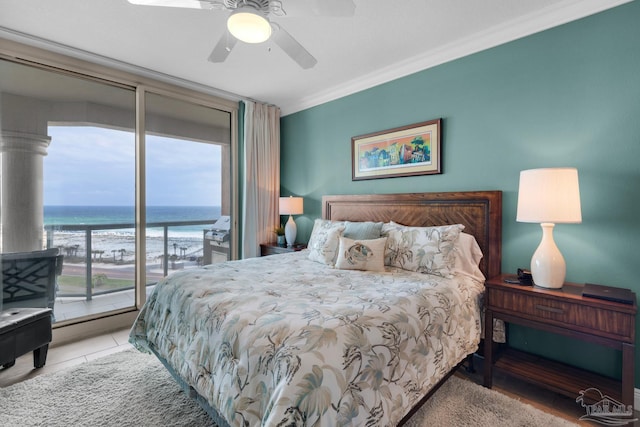 tiled bedroom with crown molding, access to exterior, a ceiling fan, and a water view