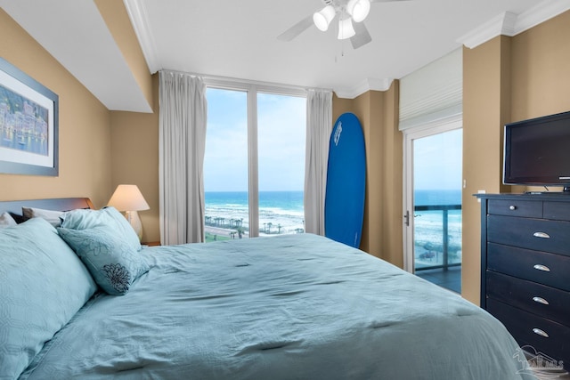 bedroom featuring a ceiling fan, crown molding, and multiple windows