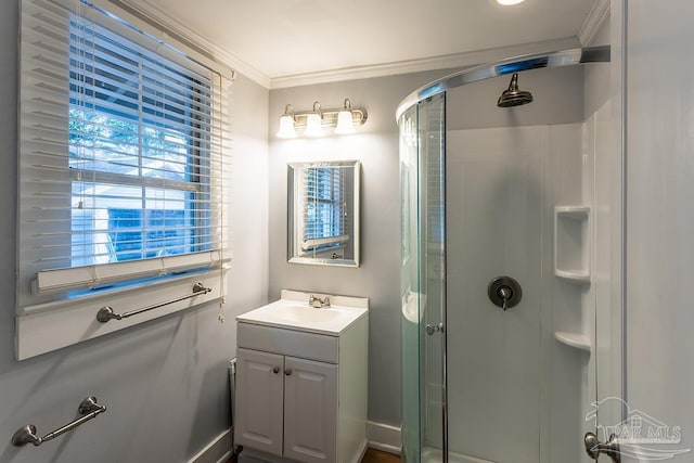 full bath with a shower stall, crown molding, and vanity