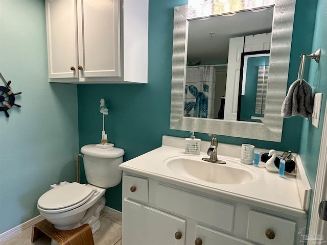 full bathroom featuring vanity, toilet, and baseboards
