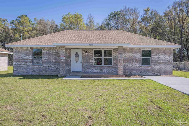 ranch-style house featuring a front lawn