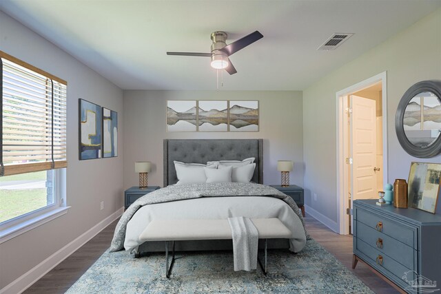 bedroom featuring dark wood-type flooring and ceiling fan