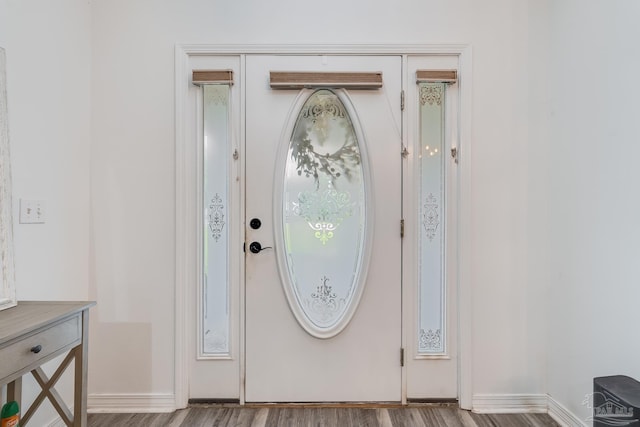 foyer with light hardwood / wood-style flooring