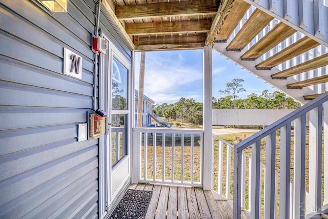 unfurnished sunroom featuring plenty of natural light