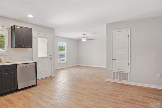 1002 Yonge St, Pensacola, FL 32501 - kitchen with dishwasher, light wood finished floors, light countertops, a ceiling fan, and recessed lighting