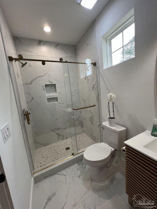 full bath featuring a marble finish shower, toilet, marble finish floor, vanity, and recessed lighting