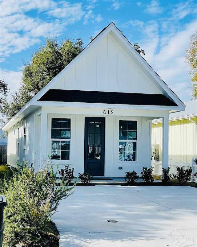 view of front of house featuring board and batten siding and covered porch