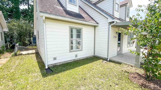 2708 Willow Grove Ln, Ft Walton Beach, FL 32547 - view of property exterior with a yard and a shingled roof