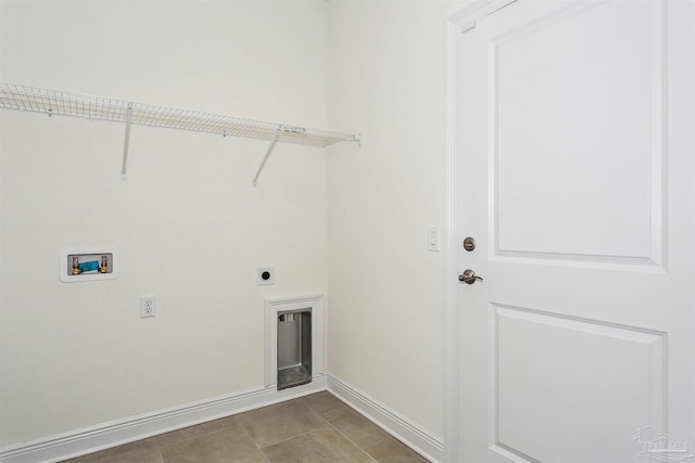 laundry area with hookup for an electric dryer, laundry area, baseboards, and hookup for a washing machine