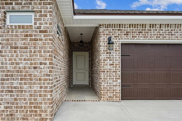 property entrance with brick siding