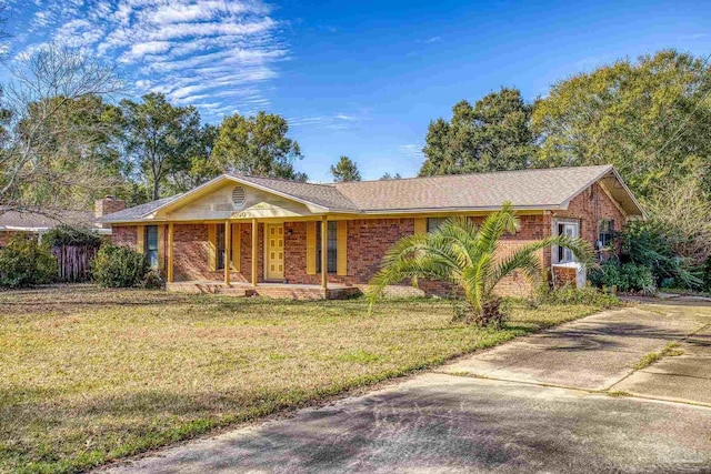 ranch-style house with a front yard