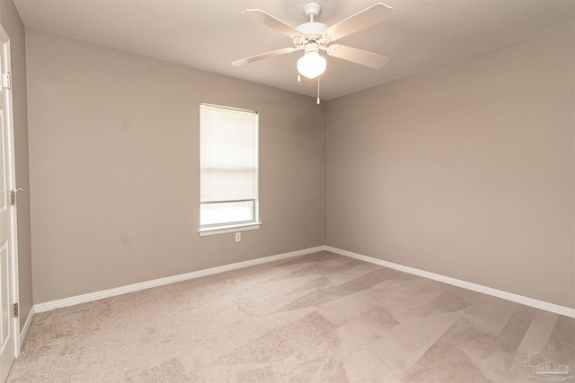 unfurnished room with ceiling fan and carpet flooring