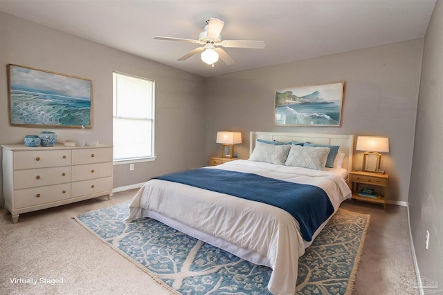 carpeted bedroom featuring ceiling fan