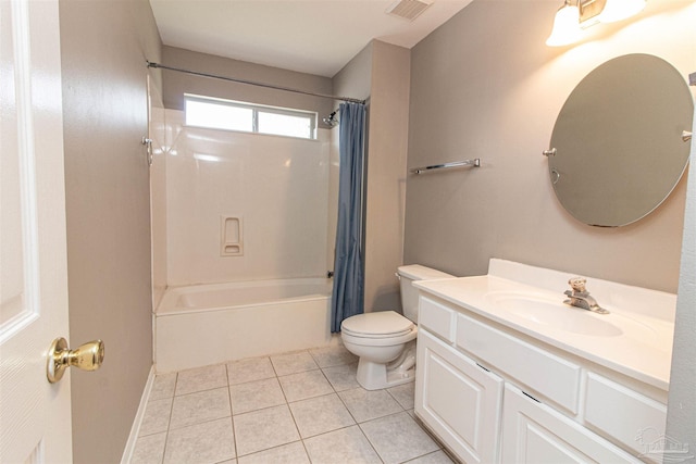 full bathroom featuring toilet, shower / bath combination with curtain, vanity, and tile patterned floors