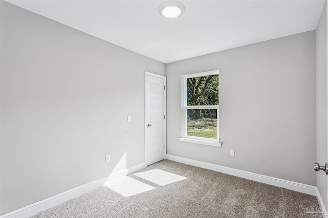 view of carpeted spare room