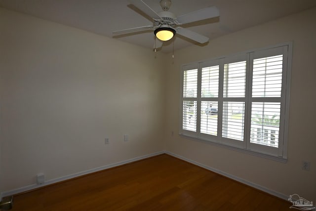 5577 Shadow Shore Pl, Gulf Breeze, FL 32563 - spare room featuring wood finished floors, baseboards, and ceiling fan