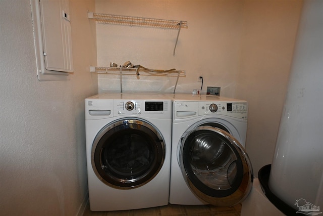 5577 Shadow Shore Pl, Gulf Breeze, FL 32563 - laundry room featuring washer and clothes dryer and electric panel