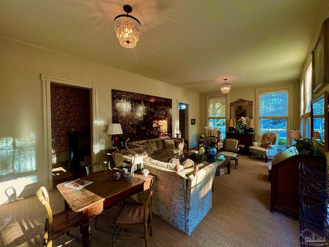 living room with a chandelier and carpet flooring