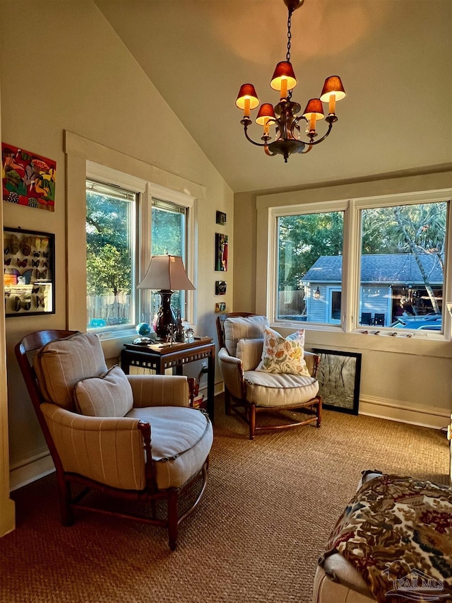 sunroom with lofted ceiling and a notable chandelier