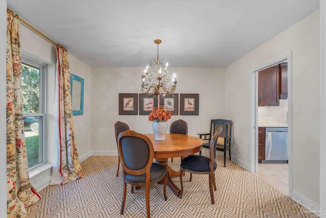 dining room with a chandelier