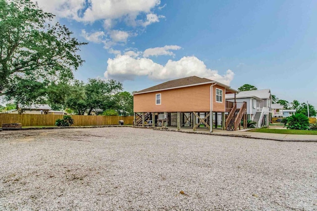 5473 Pensacola Ave, Orange Beach, AL 36561 - view of side of property featuring stairs