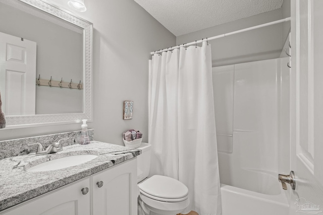 full bathroom featuring vanity, toilet, a textured ceiling, and shower / bath combination with curtain