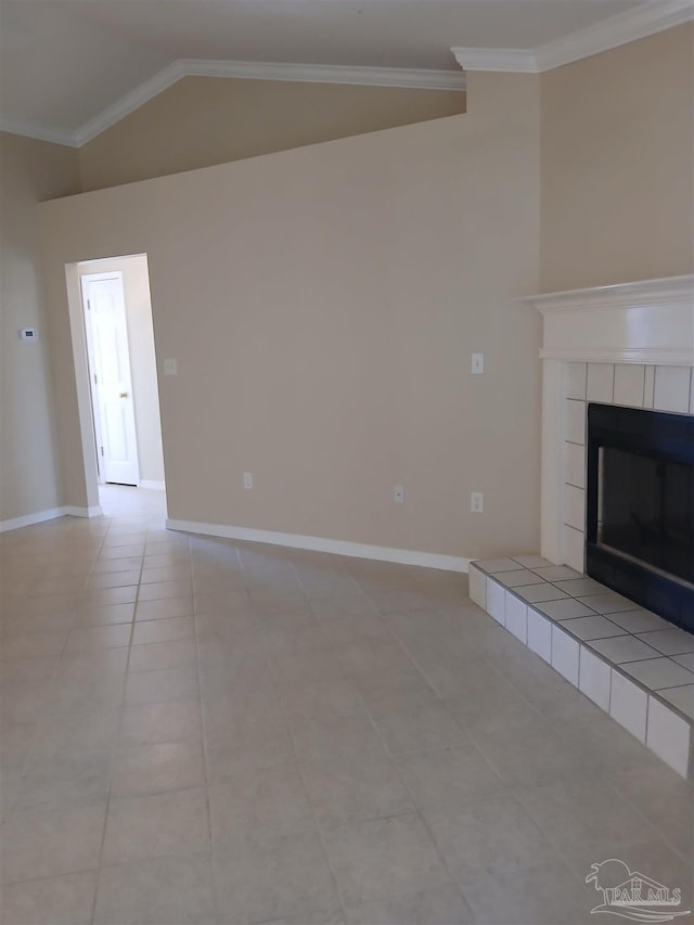 unfurnished living room featuring crown molding, a fireplace, light tile patterned flooring, and lofted ceiling