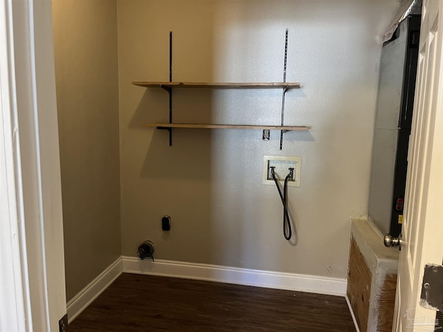 laundry area featuring washer hookup and dark hardwood / wood-style floors