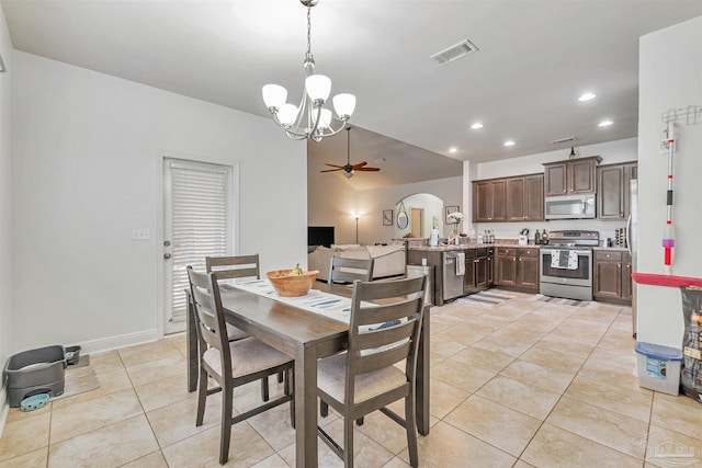 5811 Rustic Ridge Cir, Milton, FL 32570 - dining area with a chandelier, light tile patterned floors, a ceiling fan, recessed lighting, and arched walkways
