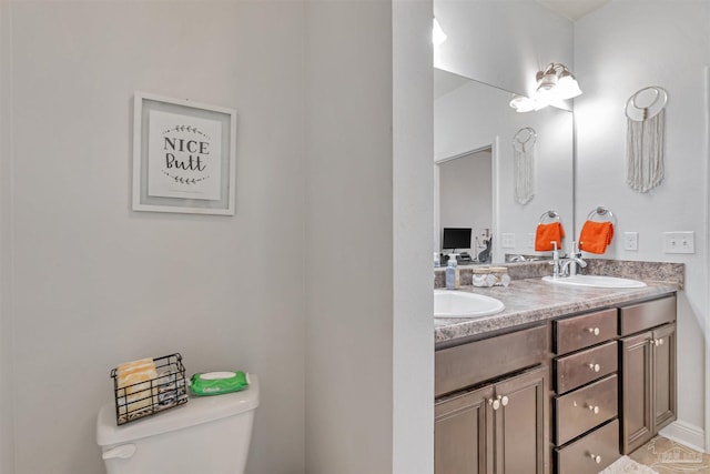 5811 Rustic Ridge Cir, Milton, FL 32570 - bathroom with toilet and double vanity