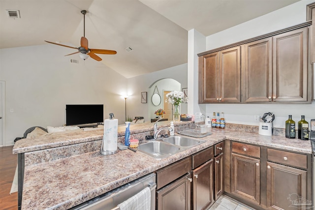 5811 Rustic Ridge Cir, Milton, FL 32570 - kitchen with a sink, lofted ceiling, a peninsula, ceiling fan, and open floor plan