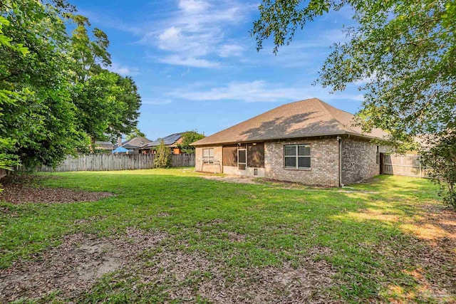 5811 Rustic Ridge Cir, Milton, FL 32570 - rear view of property with brick siding and a shingled roof