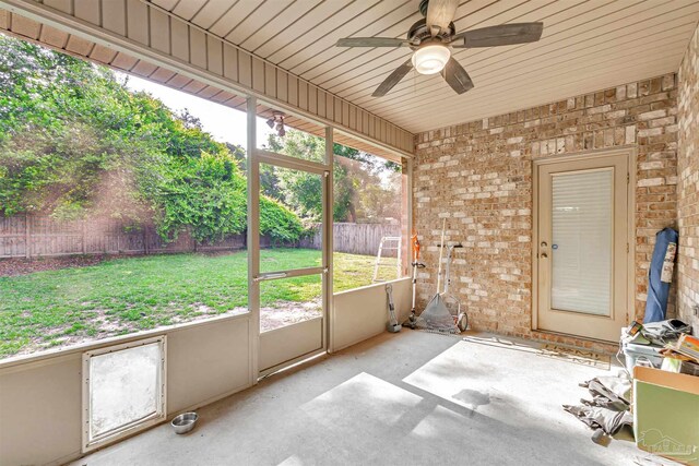 5811 Rustic Ridge Cir, Milton, FL 32570 - unfurnished sunroom featuring a ceiling fan