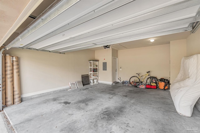 5811 Rustic Ridge Cir, Milton, FL 32570 - garage with a garage door opener and electric panel