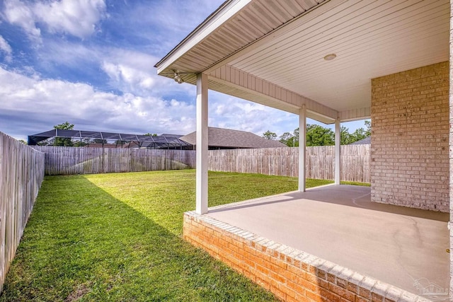 view of yard with a patio area and a fenced backyard