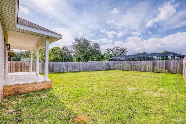 view of yard featuring a fenced backyard