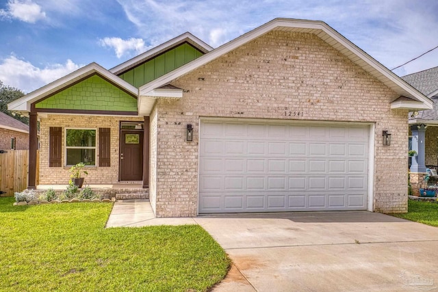 ranch-style home with fence, concrete driveway, brick siding, a front yard, and a garage