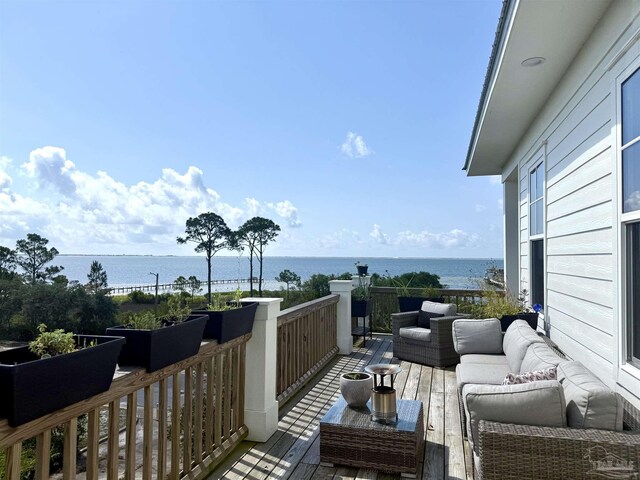 1557 Winding Shore Dr, Gulf Breeze, FL 32563 - deck with outdoor lounge area and a water view