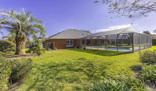 view of yard featuring a lanai