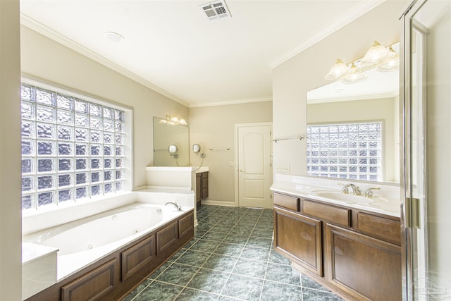 bathroom featuring vanity, crown molding, and a bathing tub