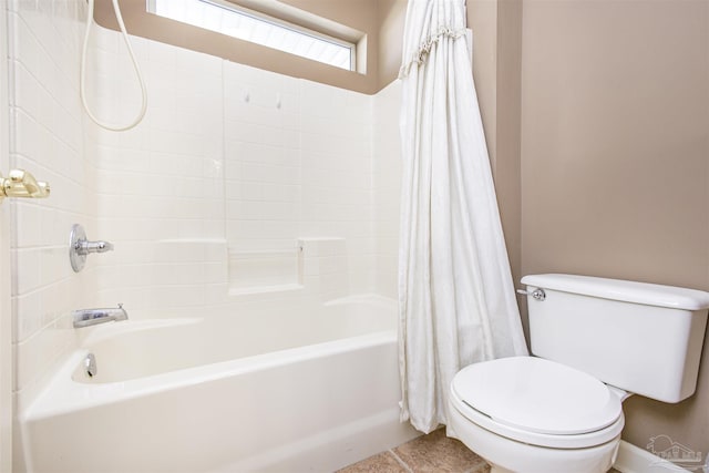 bathroom with shower / tub combo, tile patterned floors, and toilet