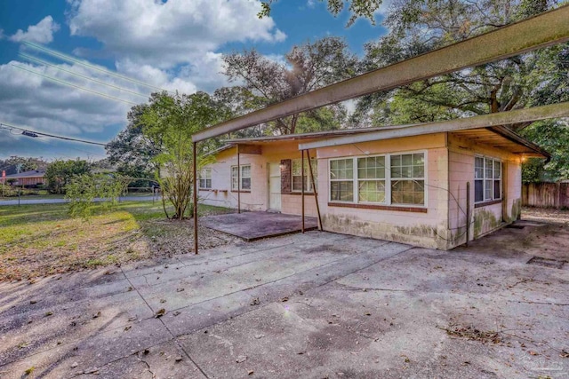 view of front of home featuring a patio