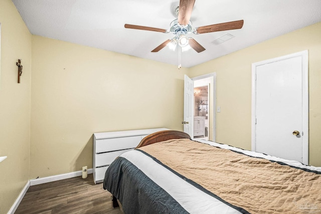 bedroom with ceiling fan and dark hardwood / wood-style flooring