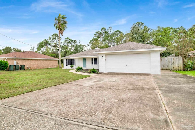 single story home with a front yard, a porch, and a garage