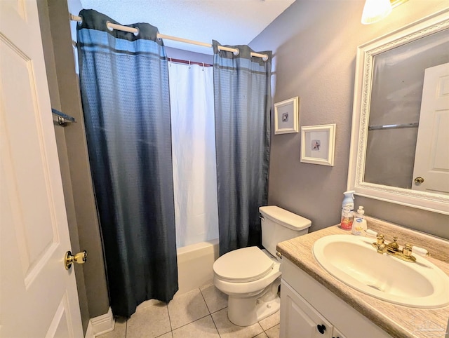 full bathroom featuring shower / bath combination with curtain, tile patterned floors, toilet, and vanity